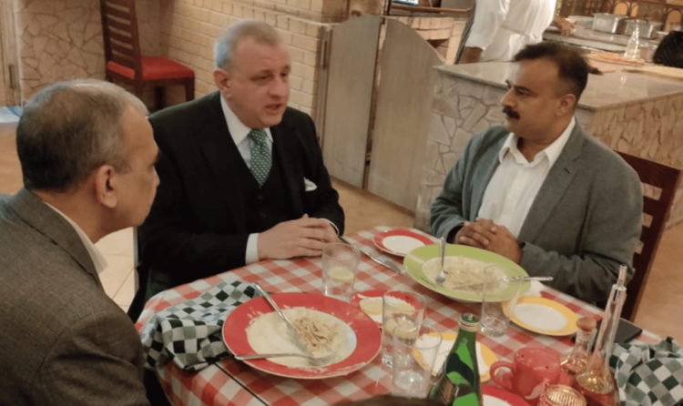 Sharing a meal with partners after closing a shipment