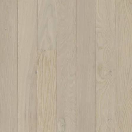 Installed white oak hardwood flooring showing tight grain and neutral tone