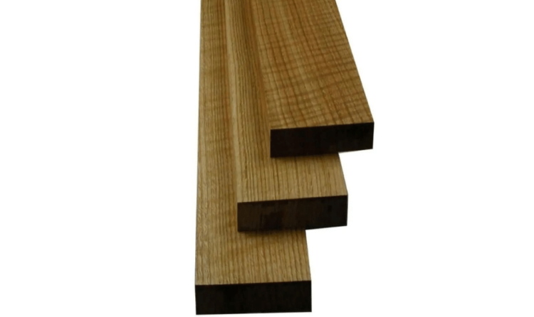 Stack of prefinished red oak flooring planks ready for install