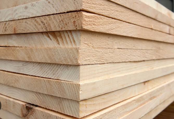 Stack of kiln-dried, dimensioned pine lumber boards
