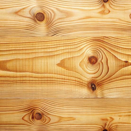 Close-up of the grain pattern on a milled pine board