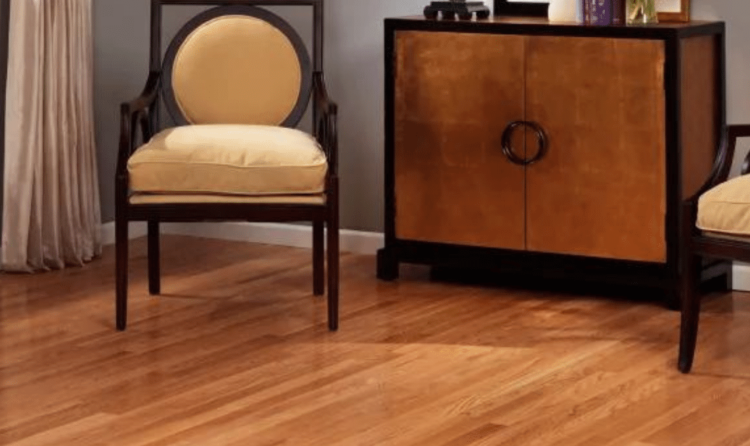 Installed red oak flooring in a living room setting