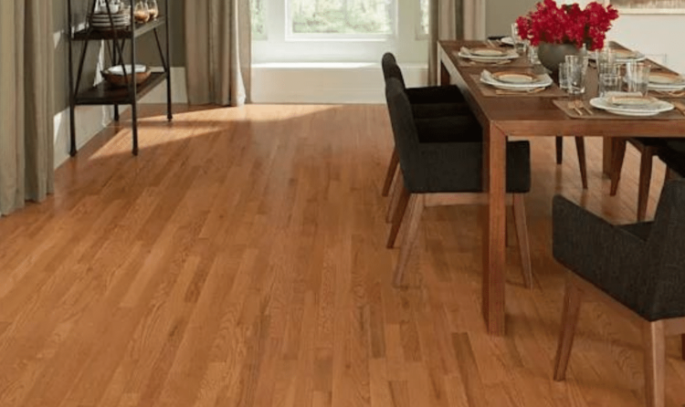 Installed red oak hardwood flooring showing natural grain and color